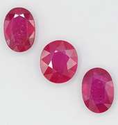 2 OVAL AND 1 ROUND VIOLET RED CUT RUBY