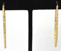 Geometrically Etched Elongated Hoops in 14KT Yellow Gold
