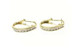 10K Yellow Gold 1.28 Ctw Diamond Channel Oval Hoop Earrings