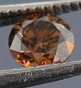 Glittering .21ct untreated rich chocolate Diamond