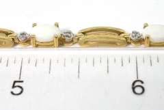 Youthful Opal Bracelet with Diamond Chips in Yellow Gold