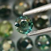 Heated only! 6.79ct round cut Sapphire set