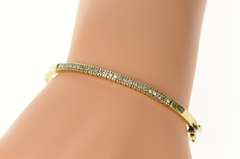 10K Yellow Gold 0.62 Ctw Diamond Channel Oval Bangle Bracelet