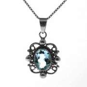 Sterling Silver Blue Topaz Filigree Oval Pendant