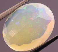 Captivating 2.61ct fairy fire semi black Opal