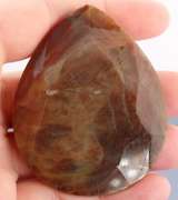 UNTREATED! Shimmering 458ct red toned faceted Sapphire