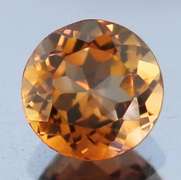 Rich red amber 3.56ct Imperial Topaz solitaire