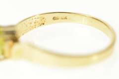 10K Yellow Gold Oval Peridot Solitaire Curved Design Simple Ring