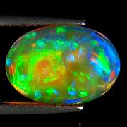 Floral flashing 3.04ct untreated semi-black Welo Opal