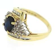 Wonderful Yellow Gold Oval Sapphire and Diamond Baguette Ring