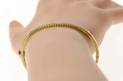10K Yellow Gold 0.62 Ctw Diamond Channel Oval Bangle Bracelet