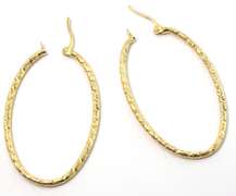 Geometrically Etched Elongated Hoops in 14KT Yellow Gold