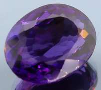 Oval cut 29.04ct deep purple created Amethyst