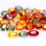 Heated only! 6.99ct fancy color Sapphire set