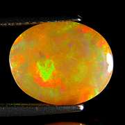 Smoldering flashing 2.92ct floral patterned Opal