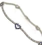 Powerful 18kt Diamond and Blue Sapphire Tennis Bracelet
