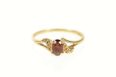 10K Yellow Gold Retro Oval Syn. Garnet CZ Accent Wavy Ring
