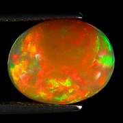 Smoldering flashing 2.92ct floral patterned Opal