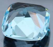 Captivating 9.17ct 12mm high fire cushion cut Topaz