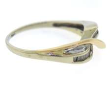 Beautiful Two Tone Gold Baguette Diamond Crossover Band