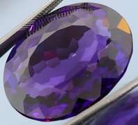 Oval cut 27.4ct royal purple created Amethyst