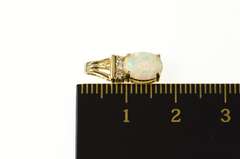 10K Yellow Gold Oval Syn. Opal CZ Accent Statement Pendant