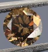 Glittering .21ct untreated rich chocolate Diamond