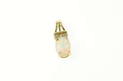 10K Yellow Gold Oval Syn. Opal CZ Accent Statement Pendant