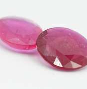 PAIR OF VIOLET RED NATURAL RUBY FACETED OVAL CUT