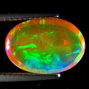 Floral flashing 3.04ct untreated semi-black Welo Opal