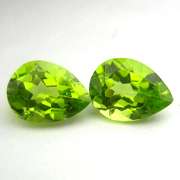 High grade 2.70ct matched Peridot set