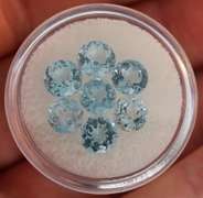 Superb quality 7.93ct 7 pc sky blue Topaz solitaire set