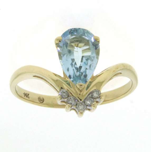 Wonderful Yellow Gold Pear Blue Topaz and Diamond Ring