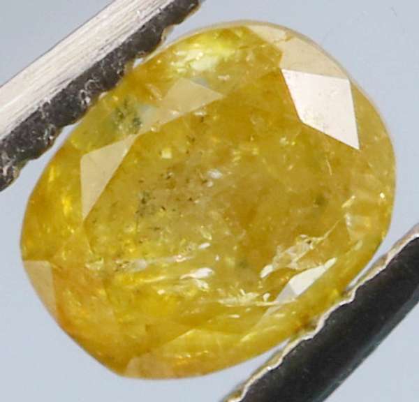 Rare .26ct oval cut yellow Diamond
