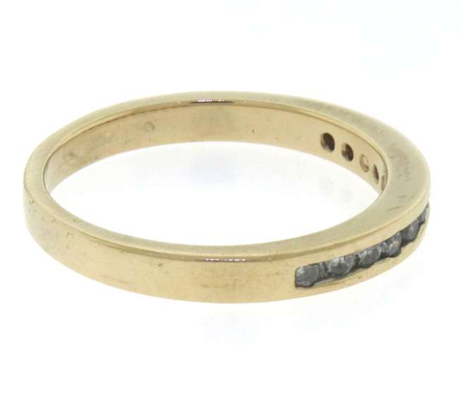 Nice Yellow Gold Round Brilliant Cut Diamond Channel Set Band