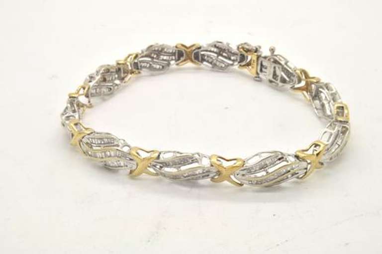 10K GOLD BEAUTIFUL TWO TONE LADIES DIAMOND BRACELET.