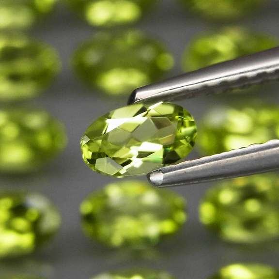 Real 7.55ct untreated apple green Peridot set