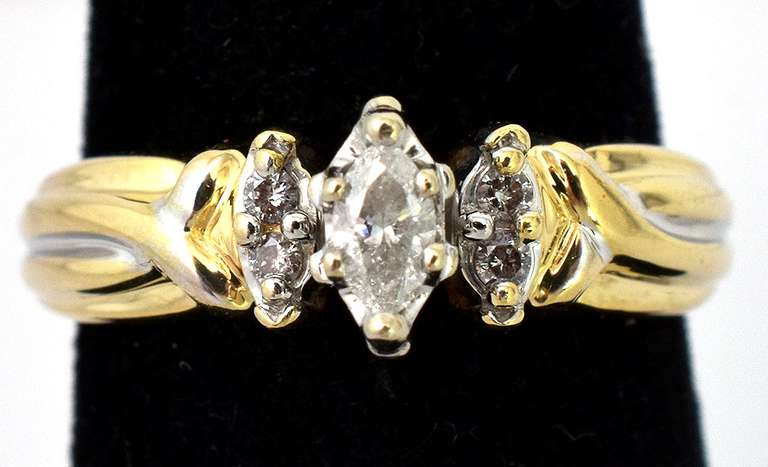 Lovely 0.12CTW Diamond Ring in 14KT Yellow Gold