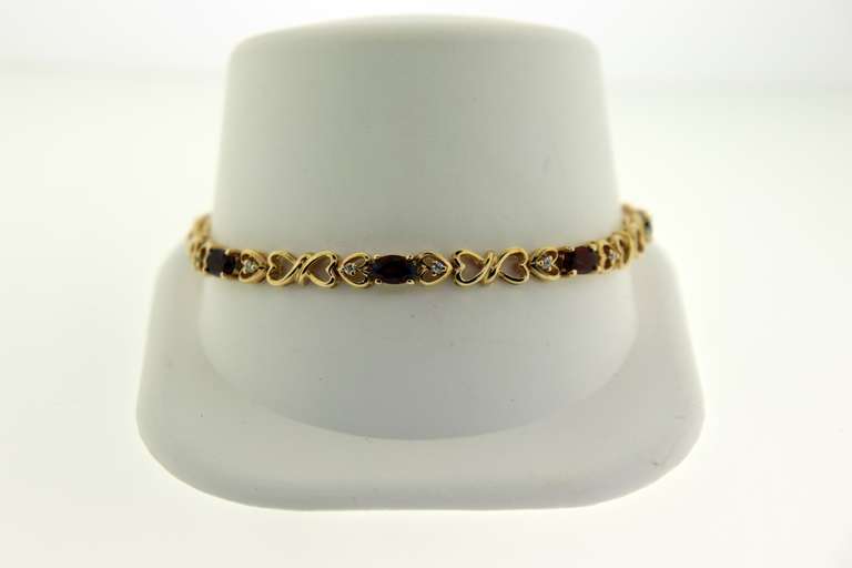 Sterling Silver Garnet Heart Tennis Bracelet