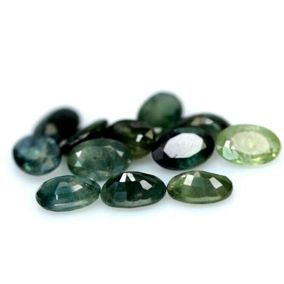 Multi-hue 6.75ct natural blue green Sapphire set