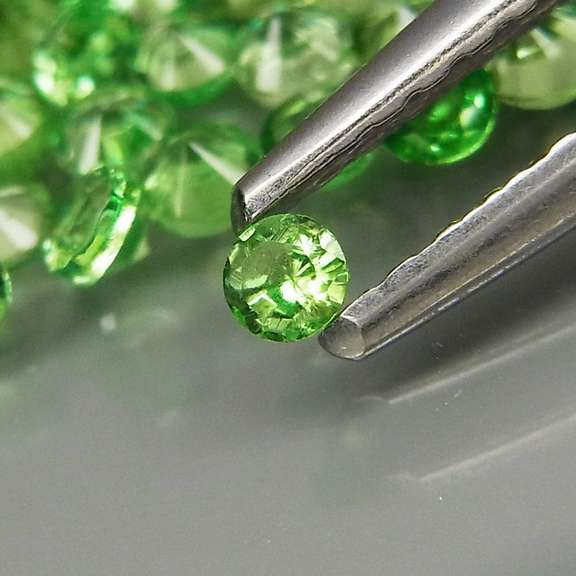 Very rare 3.89ct untreated apple green Tsavorite set
