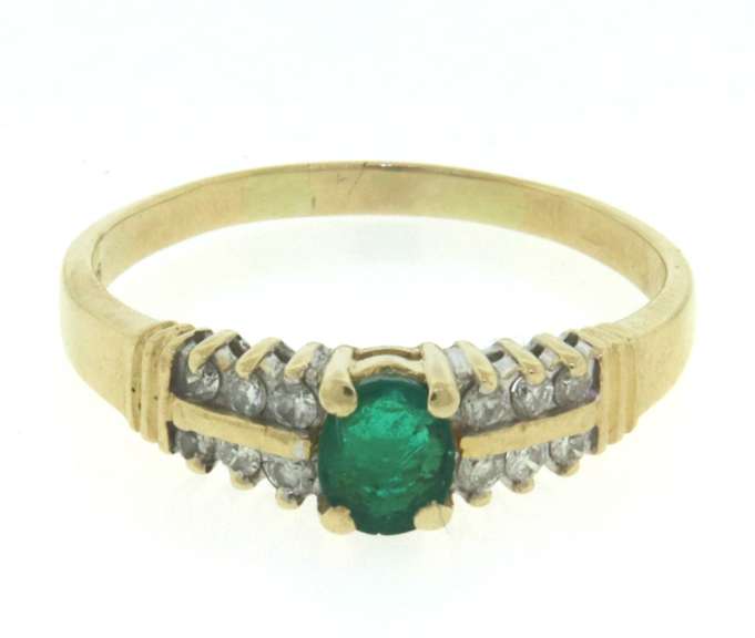 Fantastic Oval Cut Emerald & 2 Row Diamond Side Ring