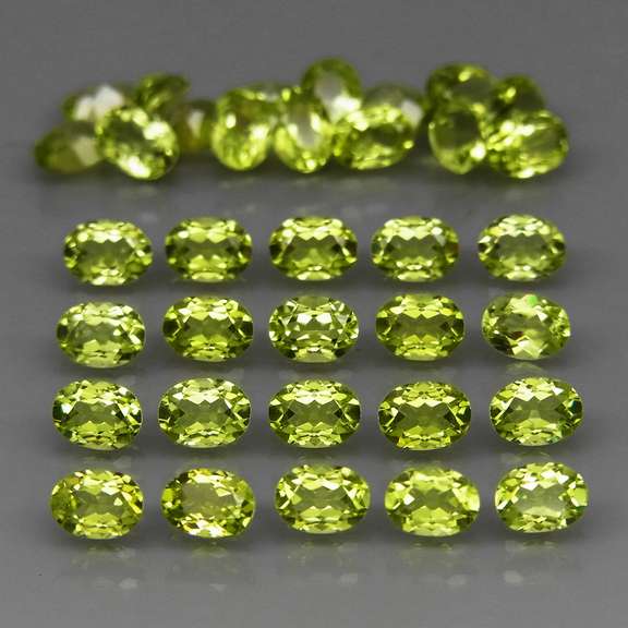 Real 6.62ct untreated apple green Peridot set