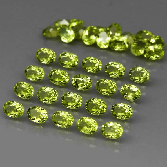 Real 6.62ct untreated apple green Peridot set