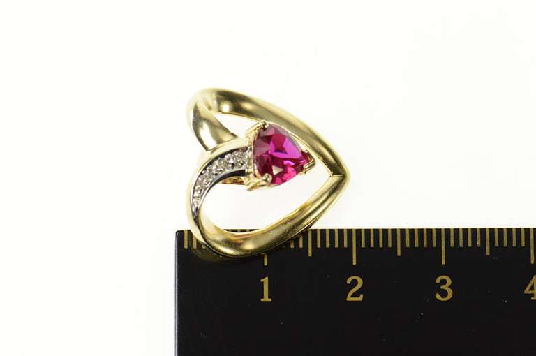 10K Yellow Gold Heart Syn. Ruby Diamond Accent Curvy Pendant