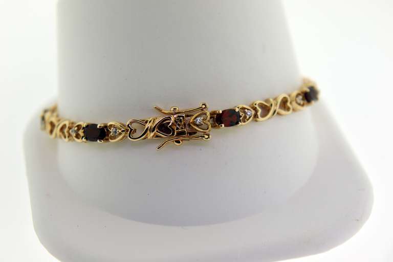 Sterling Silver Garnet Heart Tennis Bracelet
