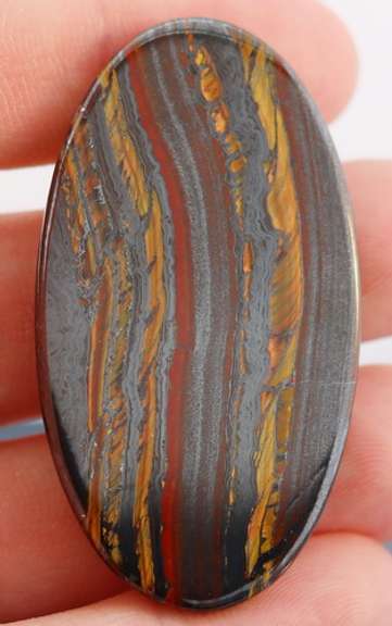Dramatic 83.96ct Tiger Eye cabochon