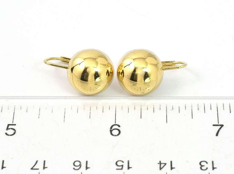 Eye-Catching Button Earrings in 14KT Yellow Gold