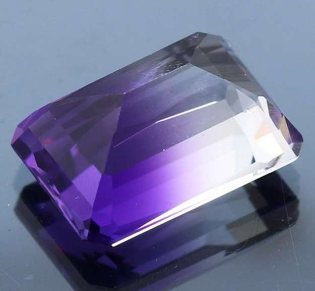 Beautiful 21.35ct top color created Ametrine