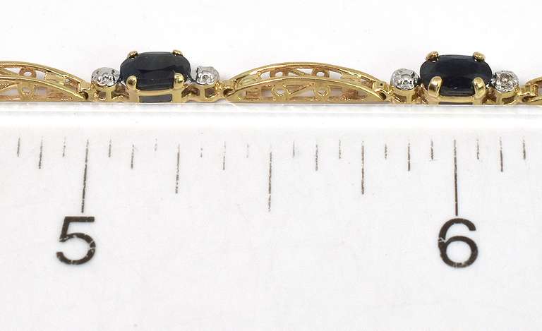 Classy 5-Stone Sapphire Bracelet in Yellow Gold